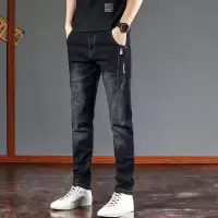 牛仔裤男士秋冬季新款加绒加厚修身小脚水洗绣花休闲长裤