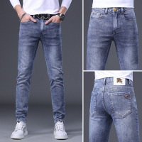 欧货牛仔裤男夏季薄款新款高端刺绣潮流弹力修身小脚长裤子男