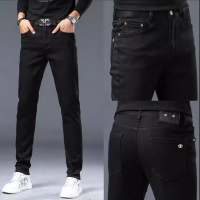 秋冬简约高端轻奢纯黑色男士牛仔裤修身小脚休闲时尚纯色长裤