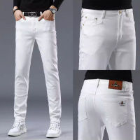 秋季新款高端白色牛仔裤男士潮牌修身小脚弹力休闲长裤子男款