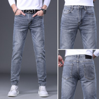 轻奢欧货春夏季新款潮牌印花修身牛仔裤男士百搭休闲小脚裤子