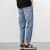 春秋浅蓝水洗牛仔裤 男士织带宽松锥形 工厂直供九分百搭长裤子