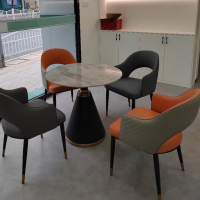 大嘉轻奢岩板喇叭盘小圆桌+4张纳帕皮洽谈椅
