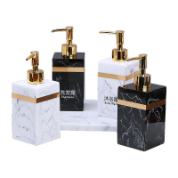 鸣固 ZJ7557沐浴露分装瓶 酒店浴室洗手液洗发水沐浴露树脂按压式分装瓶子 黑白瓶子+金边+小托盘 500ml