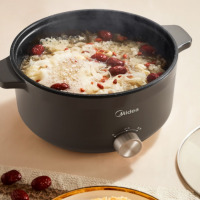 美的电火锅 电煮锅电热锅 不粘易清洗 老人用旋钮易操作 3L煎烤炒炖涮一体多功能锅电锅 MC-HGE2520