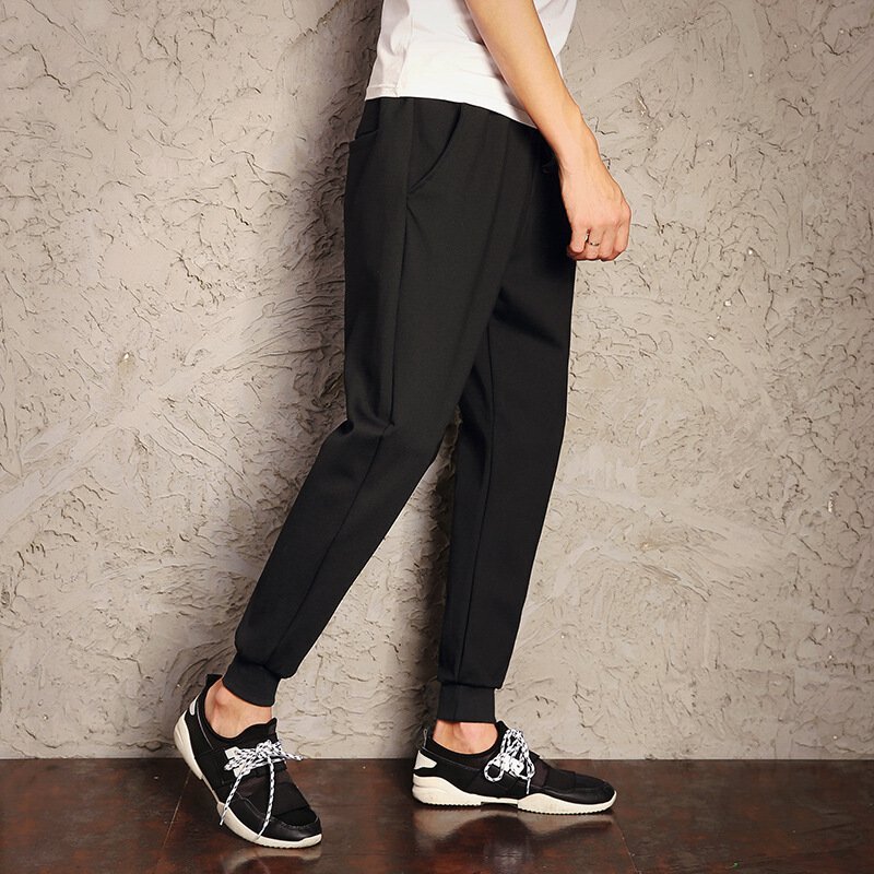 UYUK2017秋冬季新款哈伦裤男小脚裤修身休闲裤弹力卫裤潮男士运动裤长裤黑色