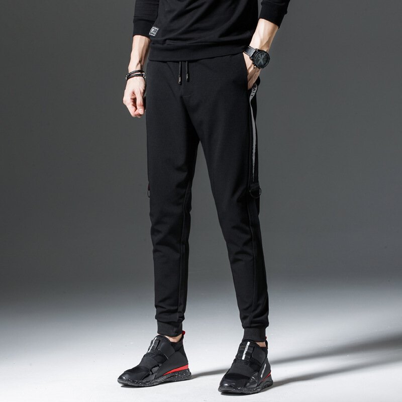 UYUK小脚裤男韩版潮流2017新款春秋冬季收口运动裤男装束脚哈伦裤休闲裤黑色