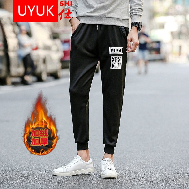 UYUK2017新款印花男生运动裤字母印花男冬季加绒加厚休闲裤男士加肥大码卫裤