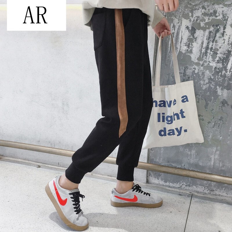 AR青年男下装冬季新款男裤子拼接撞色束脚裤学生修身潮流休闲裤黑色