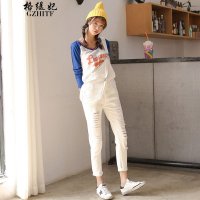 格缇妃 δ2015秋装韩版修身可爱白色破洞大码小脚背带裤女158808245