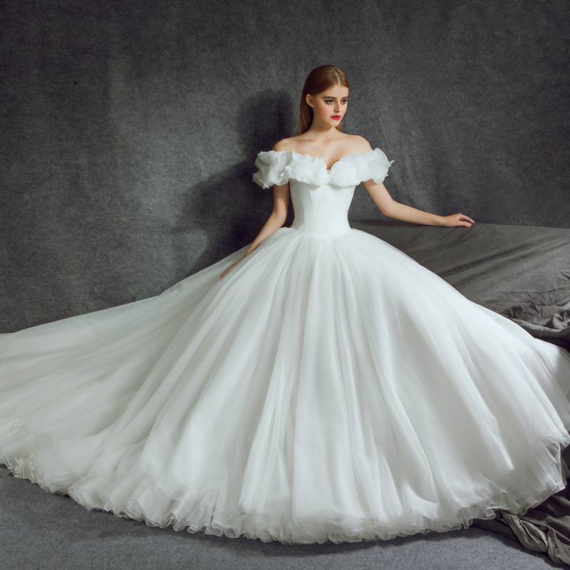 婉纱仙妮一字肩抹胸长拖尾婚纱礼服2016新款宫廷新娘泡泡袖定制