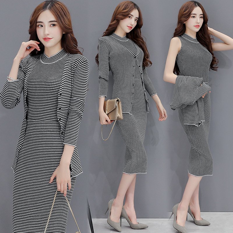 莞馨(wanxin)新款欧洲站2015秋装女黑白条纹收腰不规则开叉下摆显瘦中长连衣裙中袖