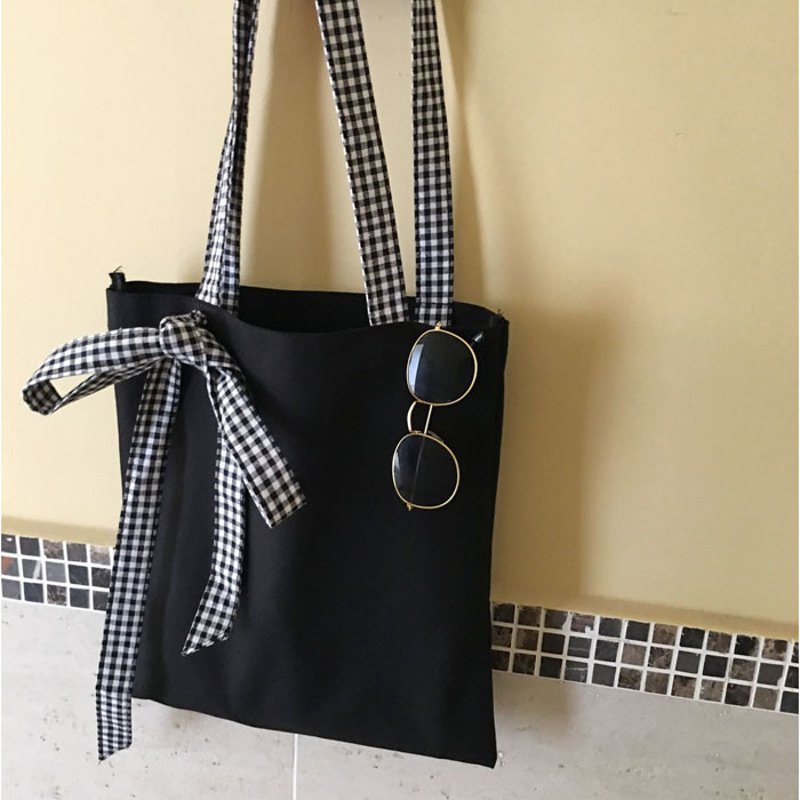 2017新款2017韩国时尚格子系带蝴蝶结单肩包百搭学生帆布包手提包女士包包