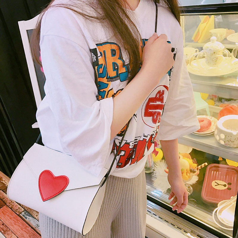 拉面丸子新款可爱软妹少女小清新爱心单肩斜挎包简约百搭学生小包mar