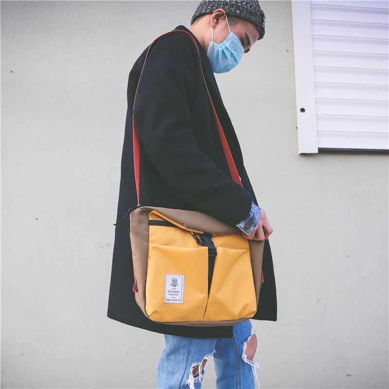 帅气单肩包情侣款韩国街头潮流休闲女包撞色运动风男生帆布邮差包