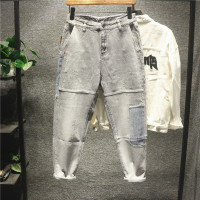 新款Hi 个性拼接印花贴布牛仔裤男士潮流百搭休闲气质长裤帅