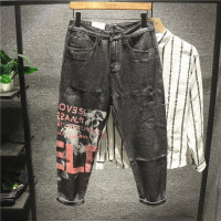 新款Hi 复古涂鸦印花拼接休闲牛仔裤男士秋冬季潮流修身小脚裤