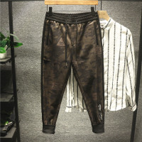 新款Hi 港风休闲秋冬迷彩休闲裤男士韩版潮流骷髅头印花小脚哈伦裤