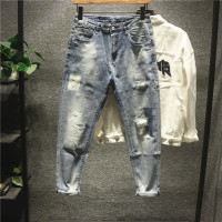 新款Hi 设计师款复古潮流乞丐破洞休闲牛仔裤男士时尚百搭小脚长裤