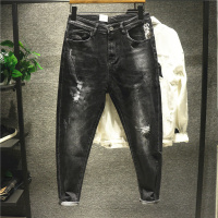 新款Hi 香港版IT曜石黑水洗刮烂破洞牛仔裤男士修身小脚裤潮流