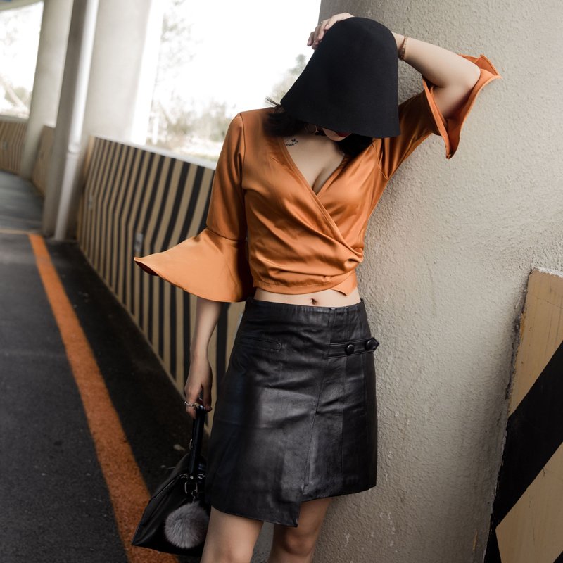 2018春秋新款真皮皮裙女A字半身裙不对称式绵羊皮街头包臀一步裙