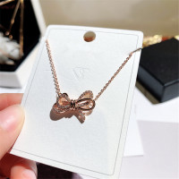 新款潮流日韩版精致镶水钻镀玫瑰金蝴蝶结项链女气质钛钢短款锁骨链