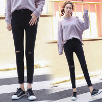 黑色膝盖漏洞牛仔裤女九分小脚春装新款弹力紧身学生毛边铅笔裤潮