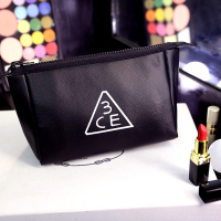 韩版简约化妆包防水便携大容量手包式收纳时尚个性黑色pu皮手拿包