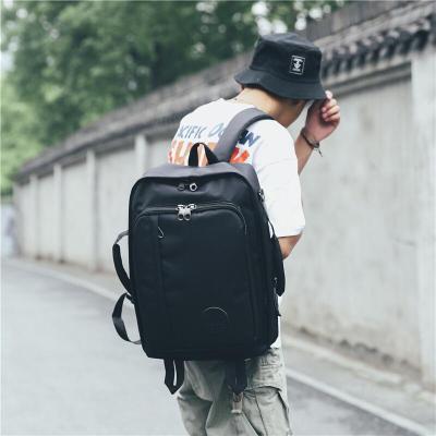 玺锉箱包 双肩包男士电脑包13/14英寸大容量背包防水学生书包 黑色