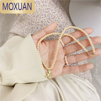 MOXUAN聪家童装韩国女童设计感宝石珍珠小众笑脸新款ins时尚小熊项链潮