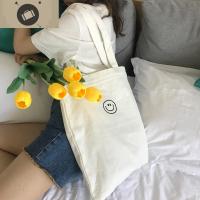 新款小清新笑脸单肩手提布包女学生学院风帆布包男购物袋 艾狄伊娃单肩包