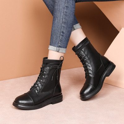 奕珂百丽牛皮马丁靴女短靴中跟方跟圆头弹力套筒时装靴女时尚气质舒适