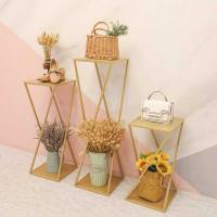 服装店高低流水台展示架简约金色女装店橱窗设计装饰展示台包包架