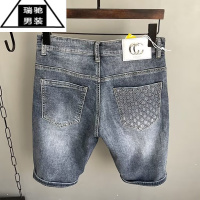 希杰狮王潮牌网红牛仔短裤男夏季薄款五分裤男士破洞刺绣个性印章休闲马裤