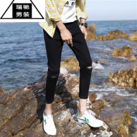 希杰狮王黑色破洞牛仔裤休闲裤男25紧身裤潮流九分裤乞丐裤修身小脚2627码