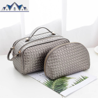 化妆包小号便携韩国简约大容量多功能收纳包手提男包女编织手拿包 三维工匠