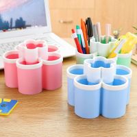 居家桌面收纳梅花形创意化妆品收纳盒塑料可爱多格梳收纳架笔筒