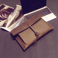 复古男女士皮质抽绳手拿包新款韩版简约手拿包时尚潮男信封ipad包 咖啡色
