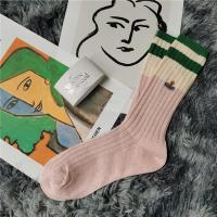 日本土星刺绣袜子女中筒学院风拼接春秋季拼色小腿堆堆袜潮