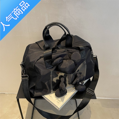 封后手提旅行包女时尚玩偶旅游单肩包新款潮短途收纳袋黑色瑜伽健身包