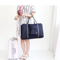旅行包女手提袋大容量行李包防水收纳袋旅行必备登机包可套拉杆箱 藏青(单层薄款)