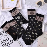 袜子女韩版中筒秋冬加厚款金银丝棉质黑色王网红学生款女长筒袜子