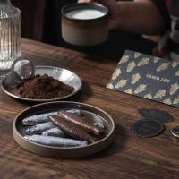 法国米歇尔柯氏Michel Cluizel 一袋沙丁鱼牛奶巧克力 创意