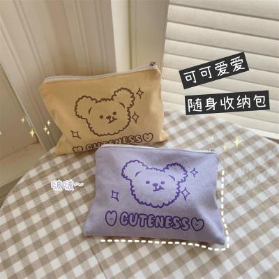 少女啵啵紫小熊帆布手拿包收纳袋化妆包化妆袋