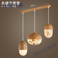 设计师北欧创意单头实木纹坚果吊灯餐厅卧室床头时尚铁艺吊灯