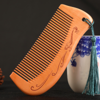 天然檀木檀香木头梳子桃木家用网红款按摩脱发男女长发专用防 13cm孔雀桃木梳[简装]