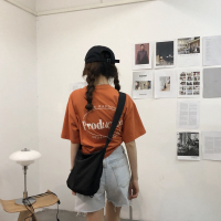 乌77酷帅风衣料斜挎包抽绳隔层拉链包肩带可调卡袋单肩包流浪包女 黑色 预售