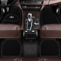 汽车脚垫四季防滑通用免安装防水耐脏绒面单片司机前排车用地毯式 四片装黑边白脚印