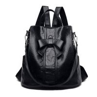 卡帝乐鳄鱼防盗软皮双肩包女2021新款韩版潮蝴蝶结真皮质感旅行包 黑色