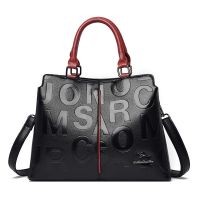 袋鼠真皮包包2021新款女时尚单肩斜跨手提包女大容量轻便喜婆婆包 黑配红